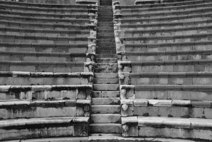 Stone amphitheater seating with central stairs